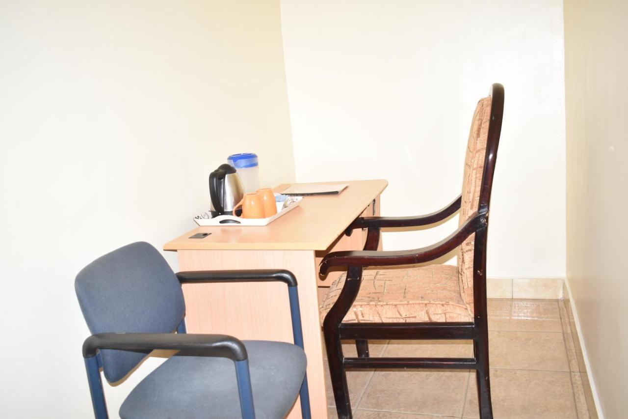 Rainbow Executive Lodge Boma la Ngombe Bagian luar foto