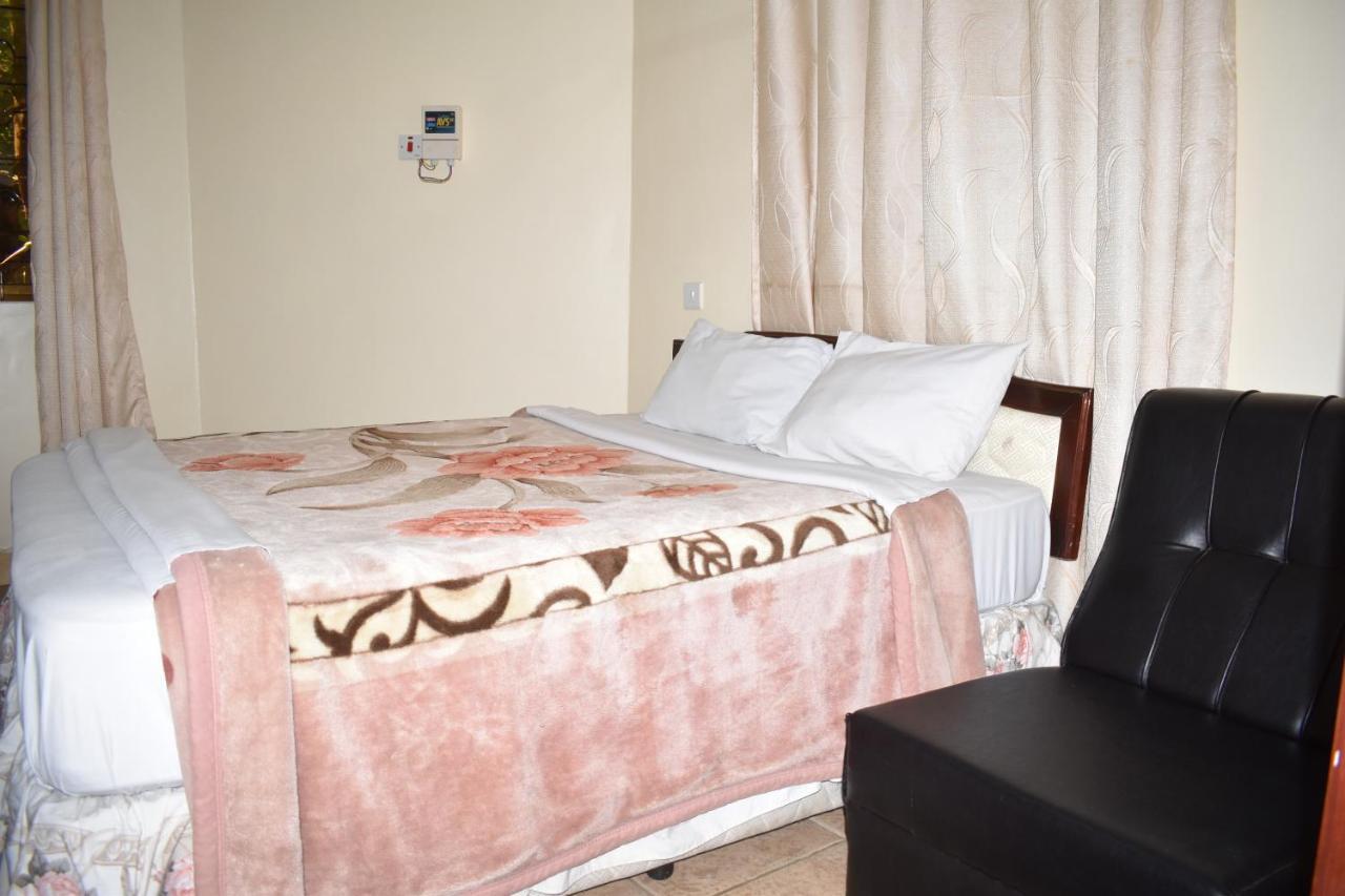 Rainbow Executive Lodge Boma la Ngombe Bagian luar foto